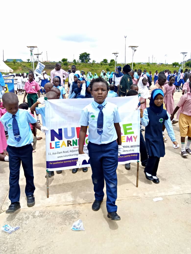 NLA Marching with Banner